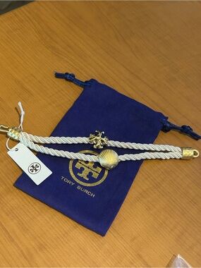 Tory Burch Ivory Rope Bracelet with Gold Shell & Logo Charms